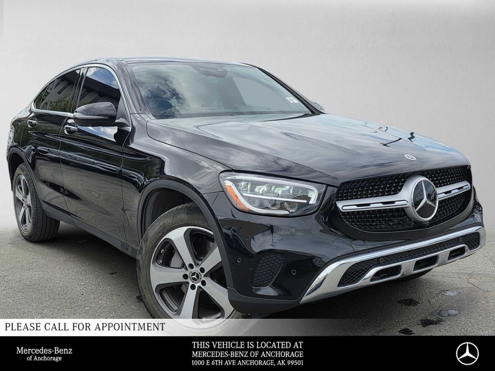2021 Mercedes-Benz GLC 300 4MATIC Coupe in Obsidian Black Metallic — front three-quarter view